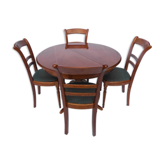 Table ronde à pied central et suite de 4 chaises