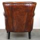 Stylish sheepskin leather armchair with a refined appearance