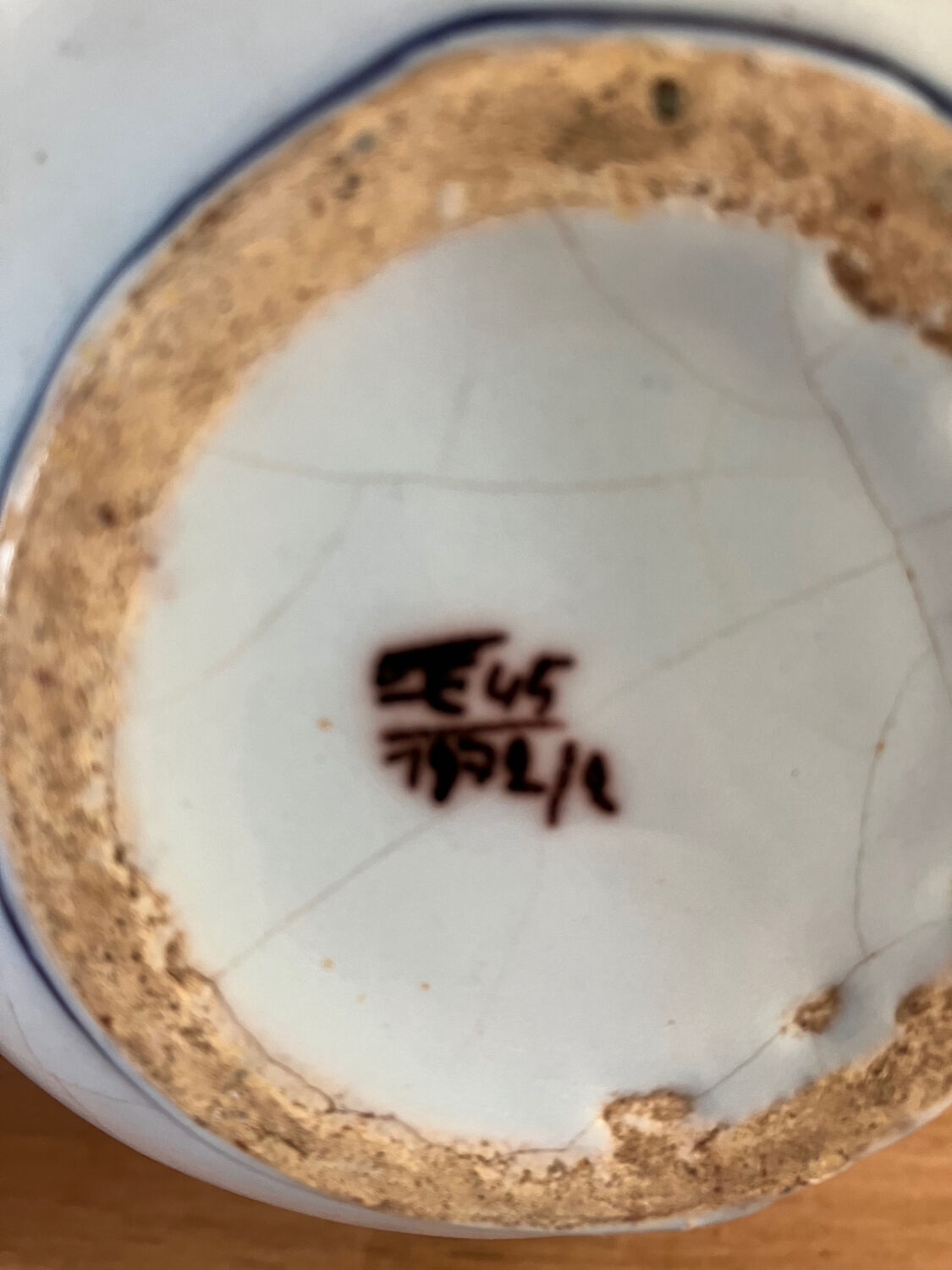 Old vase with floral motif inspired by desvres earthenware