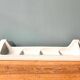 Large Art Deco wall shelf in white porcelain