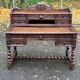 19th-century Renaissance carved oak desk with chair