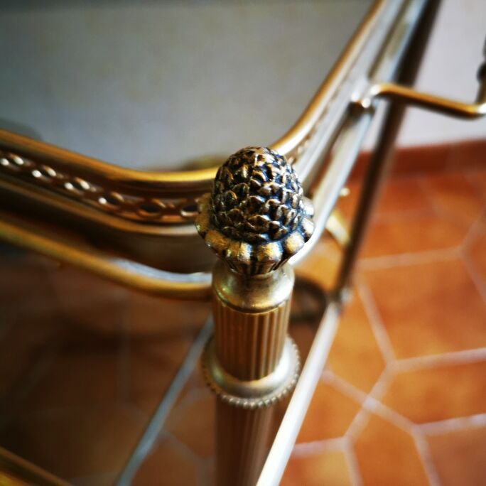 Golden metal serving trolley