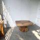 Organic brutalist coffee table in solid cedar, trunk pedestal, 1970s.