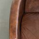 Cowhide armchair in Aviator design in a warm brown colour