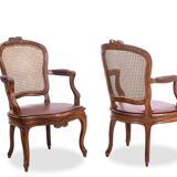 Pair of “cabriolet” armchairs in walnut and canework. Louis XV period. LS5209325