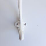White peg in metal
