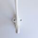 White peg in metal