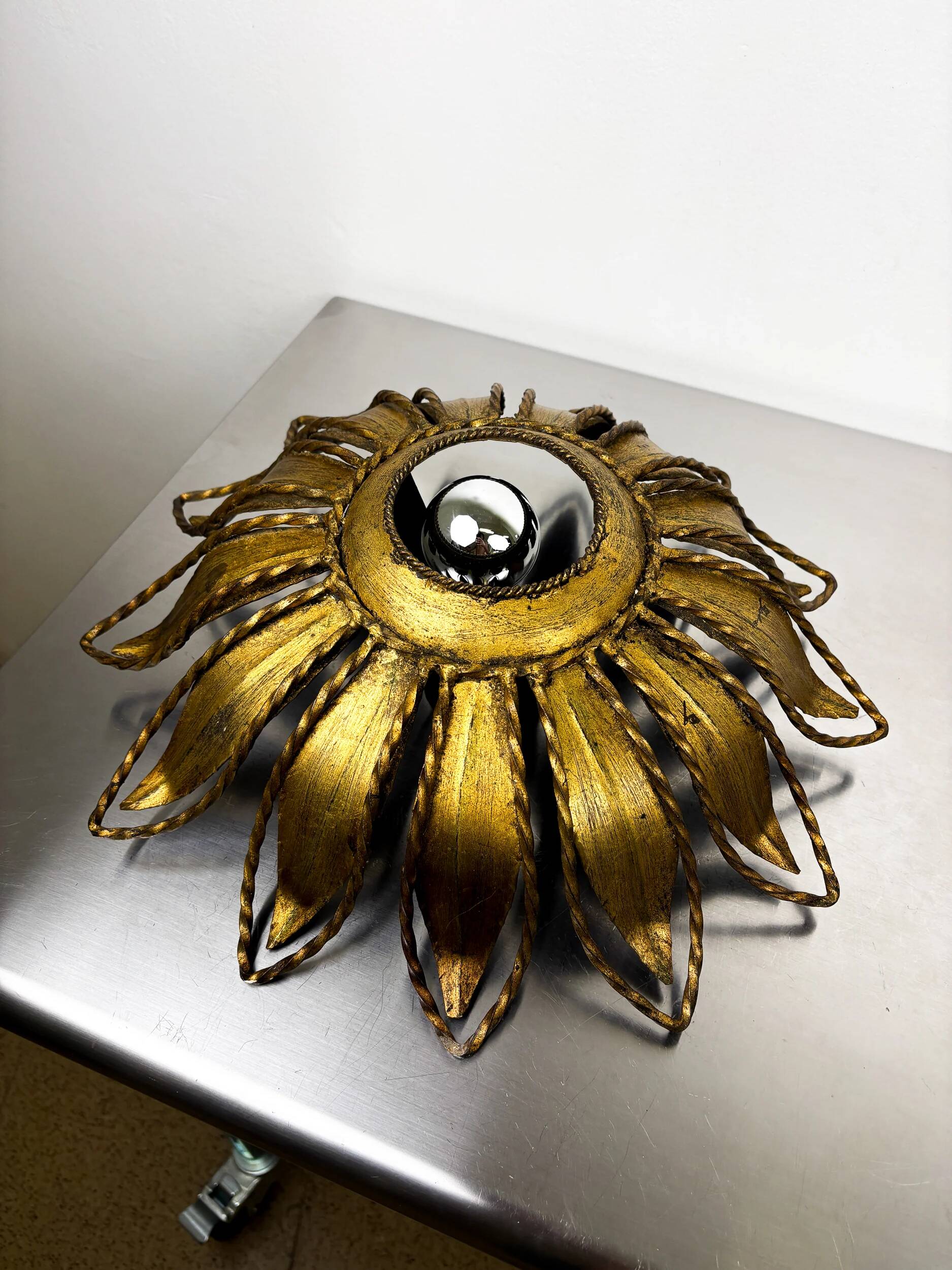 Spanish sunburst ceiling light fixture or sconce in gilt iron, circa 1960
