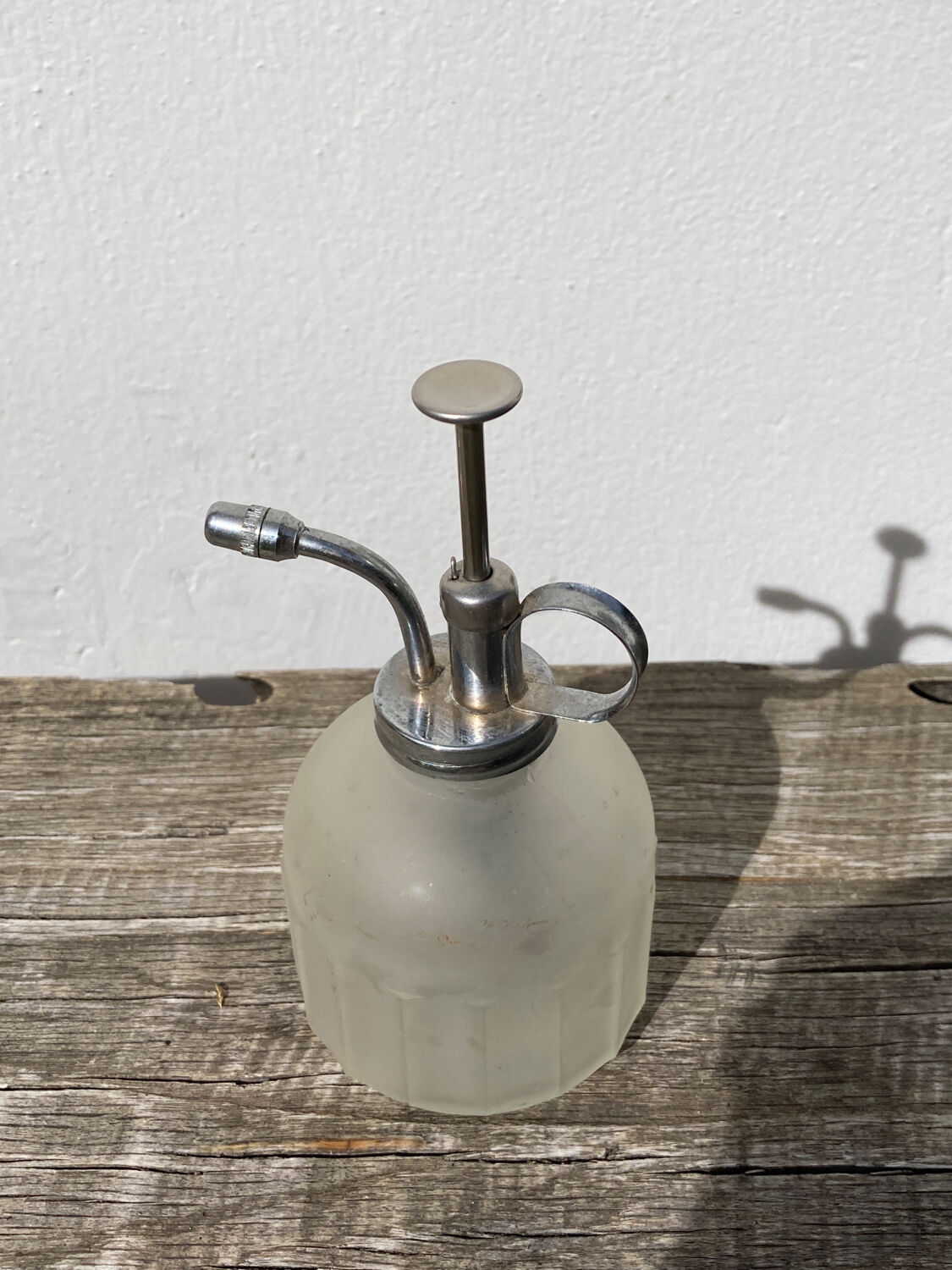 Plant sprayer opaque glass and metal