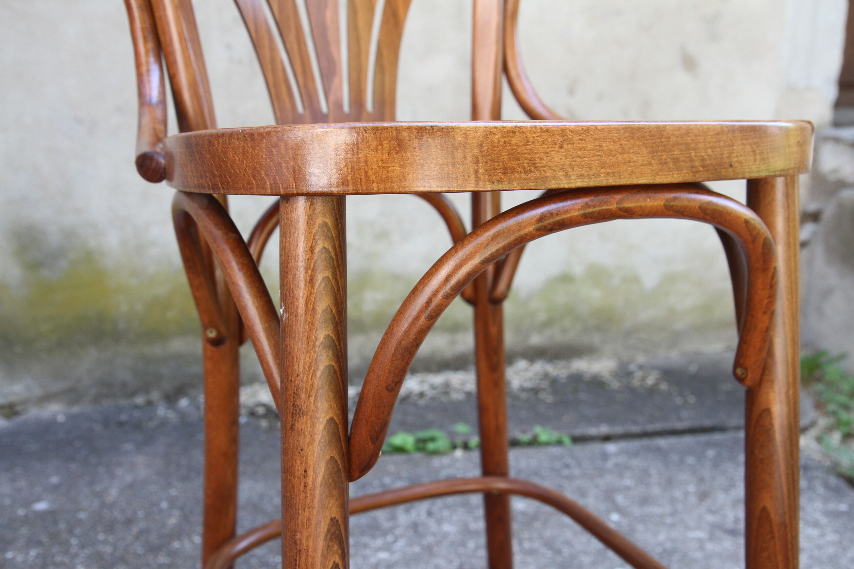 High curved wooden bar chair