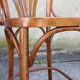 High curved wooden bar chair