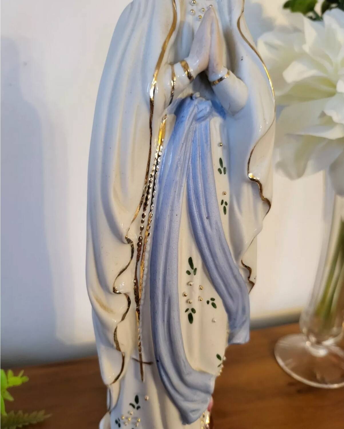 Religious statuette of the Virgin Mary in bisque porcelain