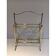 Neoclassical brass magazine rack, attributed to Maison Jansen, French work, circa 1940.