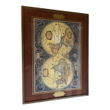 Wood and brass coffee table with a world map under glass.