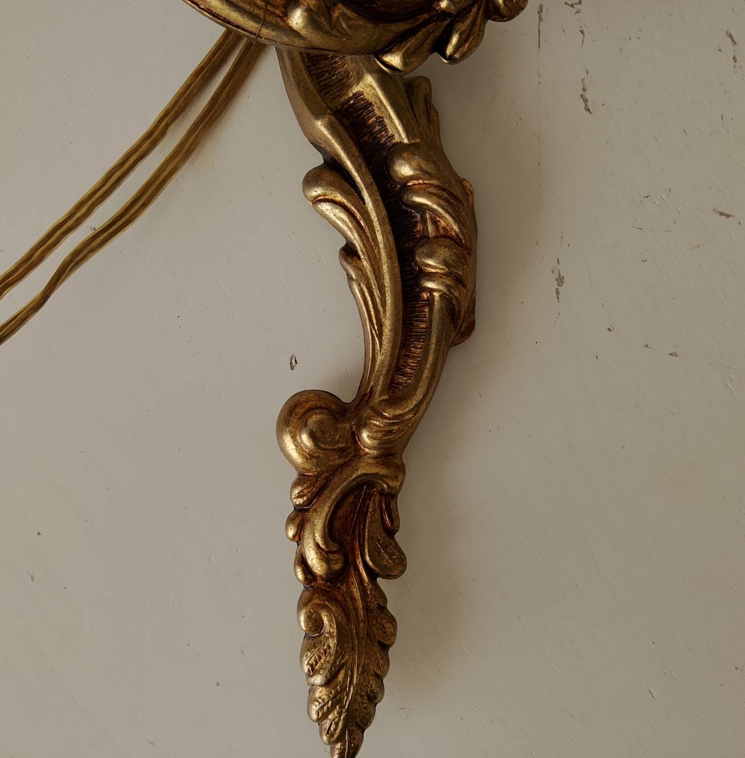 Pair of antique Rococo wall sconces in Louis XV style.