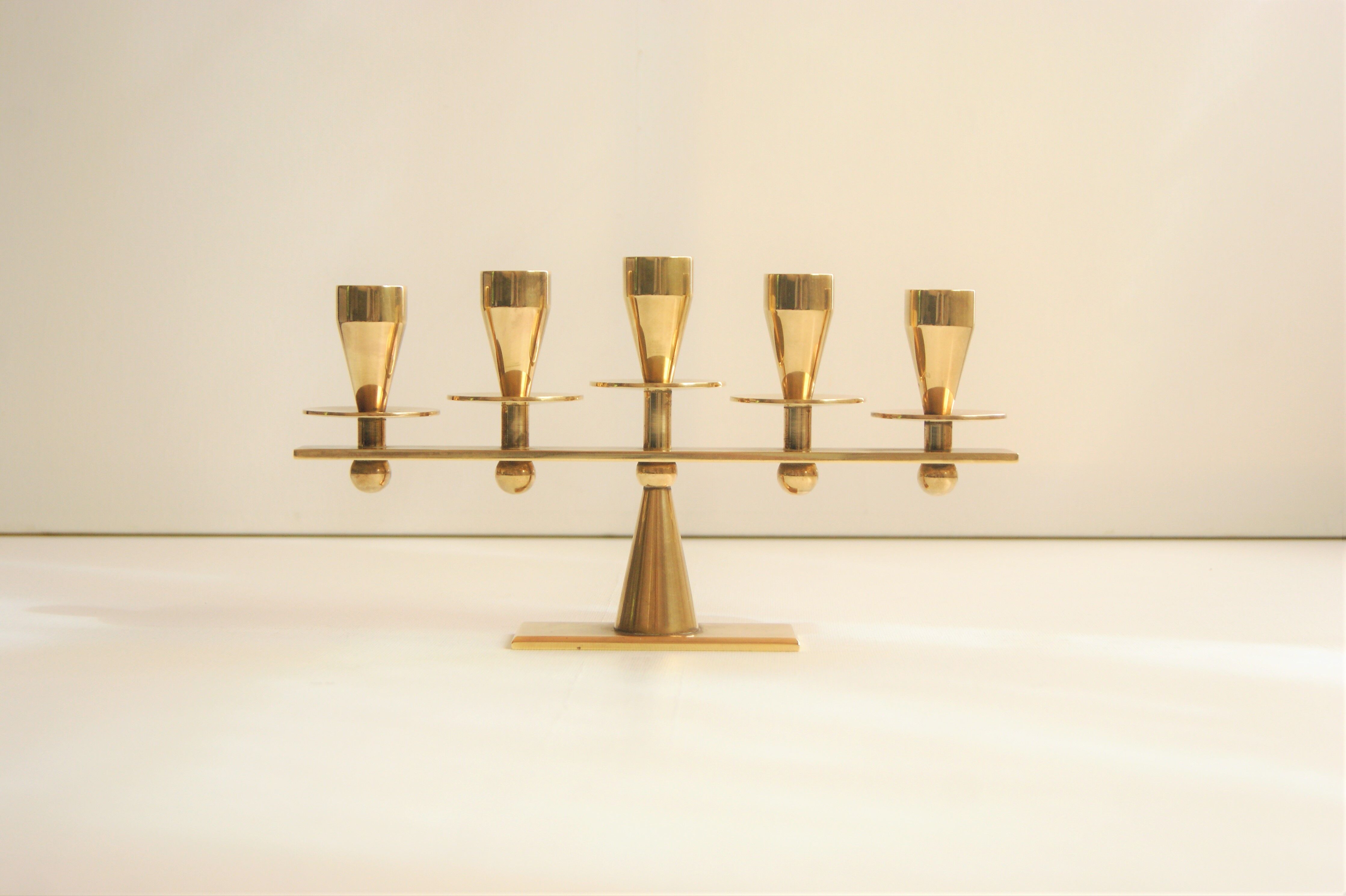 Rare mid-century modern brass candle hold from KARA Denmark 1960s.