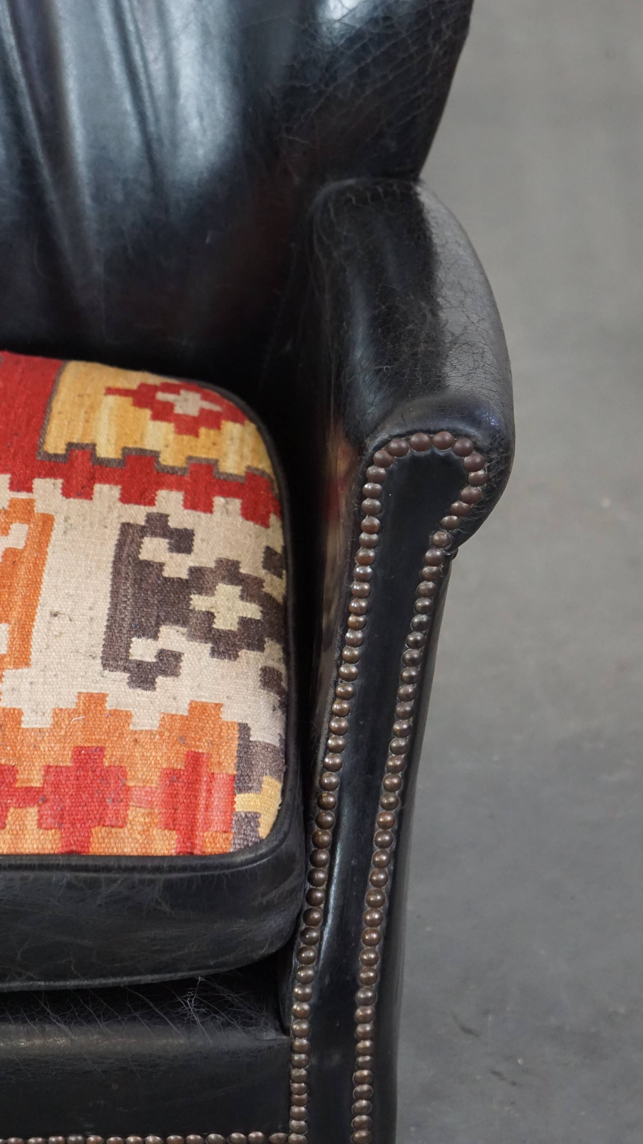 Fauteuil en cuir de vachette noir