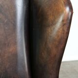 Fauteuil à oreilles en cuir de vache de style anglais avec des couleurs uniques et un excellent confort