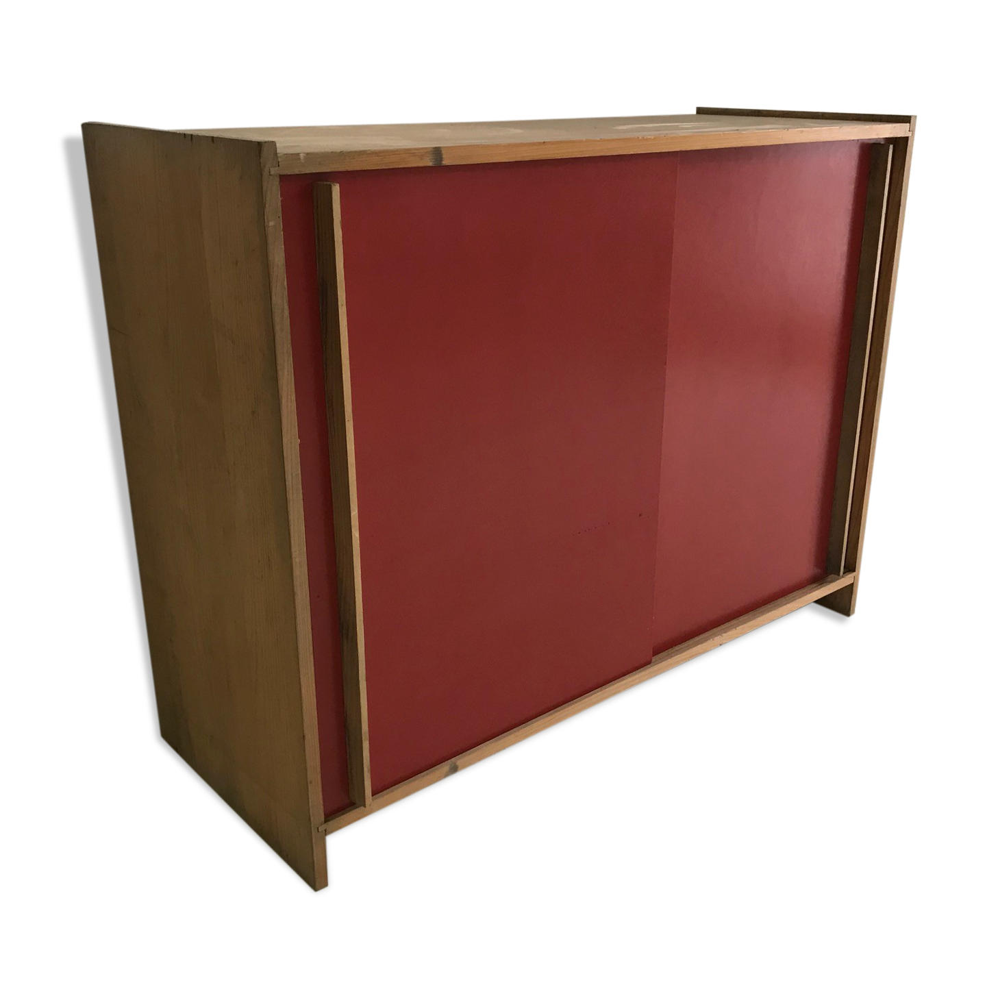 Vintage furniture with red sliding doors