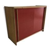 Vintage furniture with red sliding doors