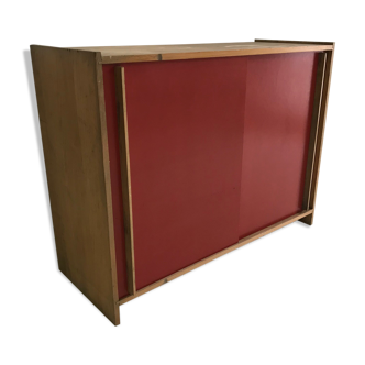 Vintage furniture with red sliding doors