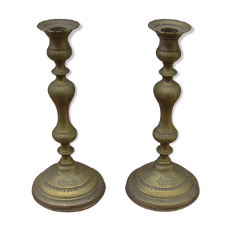 Pair of candle holders with oriental decoration