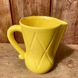 Vintage lemon yellow ceramic pitcher.