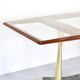 Table à manger italienne du milieu du siècle en acajou, laiton et marbre. Fr