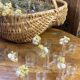 Knife rests, flower vases and candle holders in blown glass.
