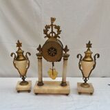 Clock fireplace trim and two vases in onyx and bronze style Louis XVI