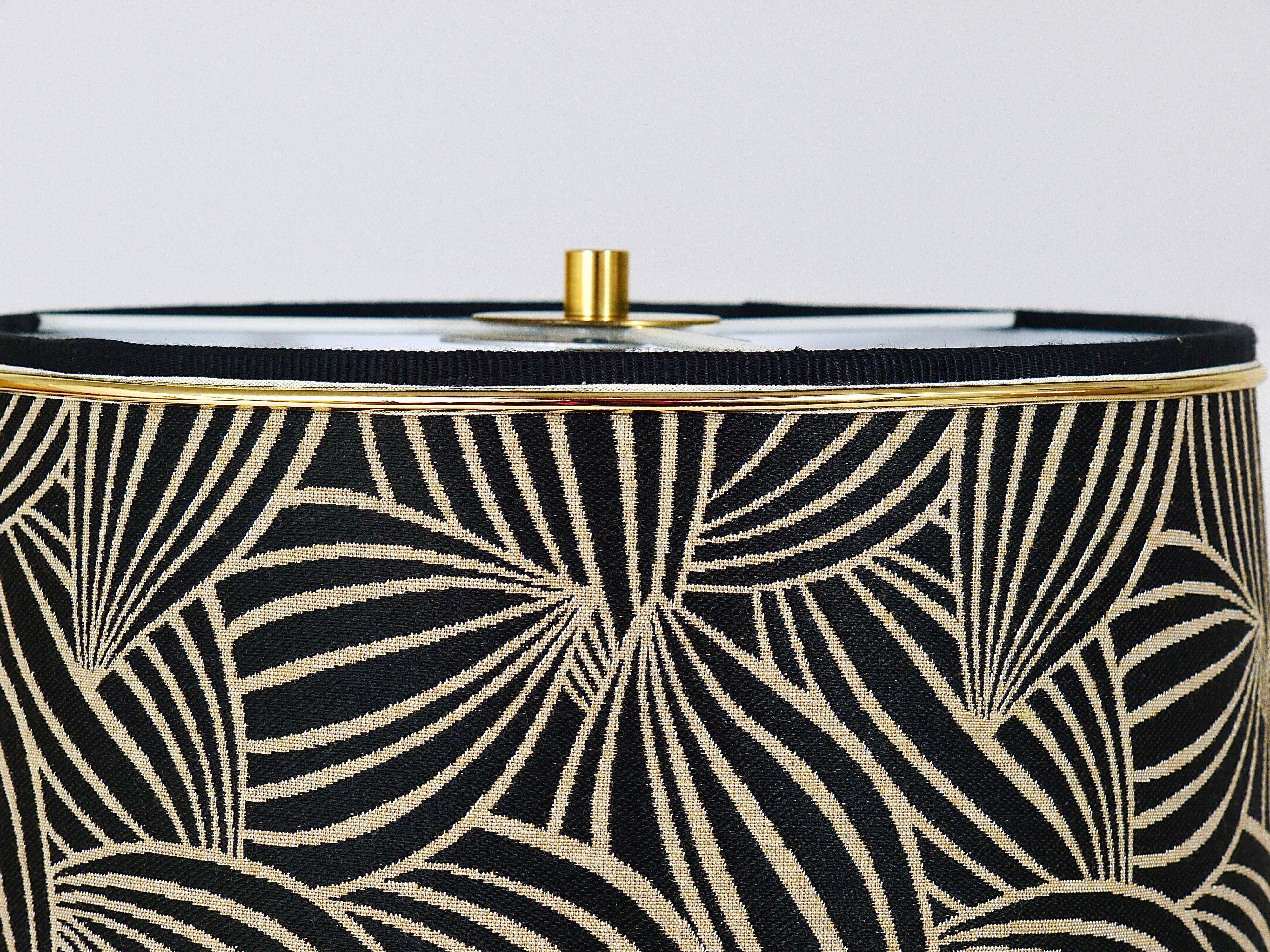 Rupert table lamp by Nikoll mid-century in brass tube and bubble glass, Austria, 1950s.