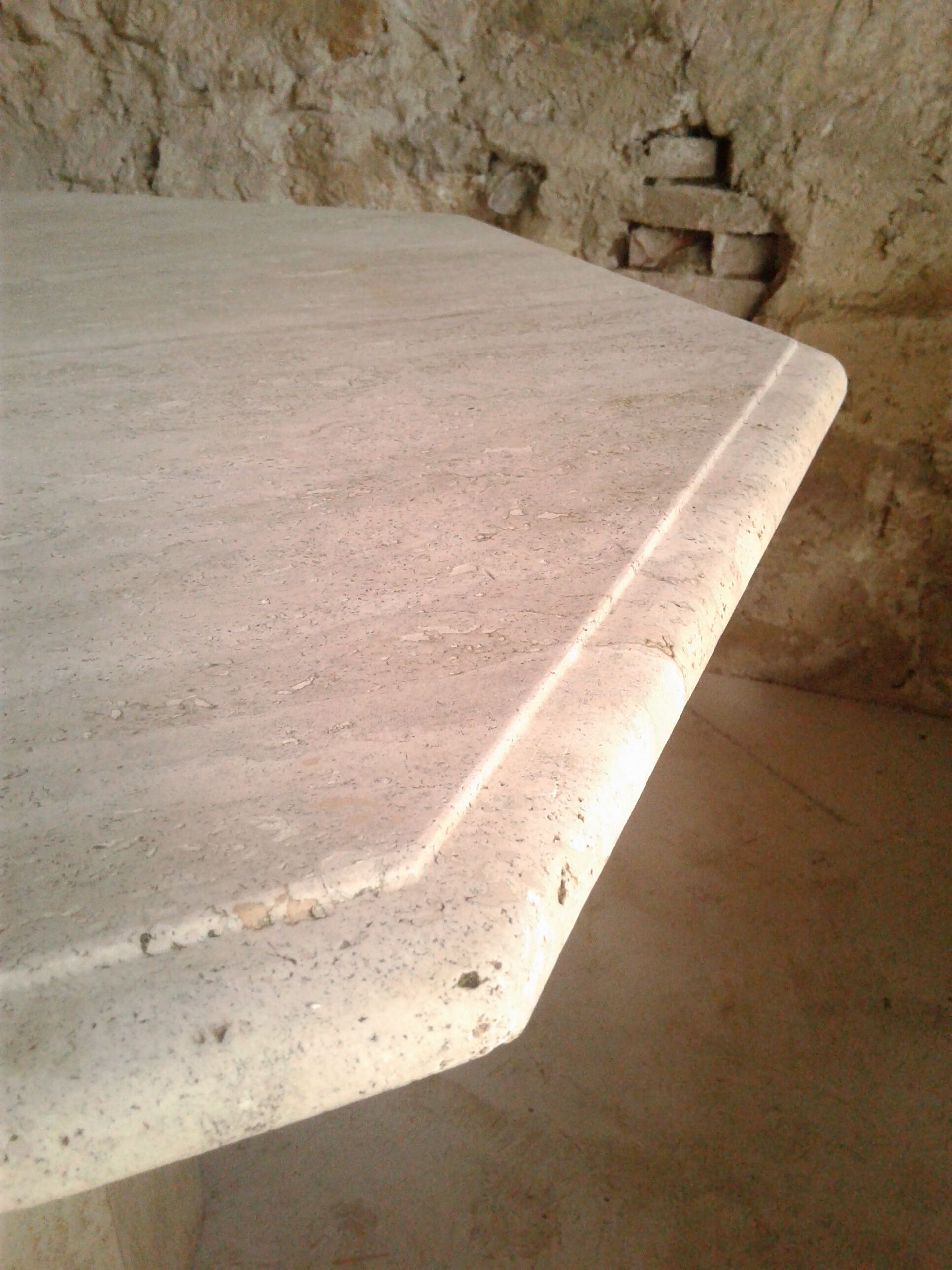 Octagonal table in travertine, 80s