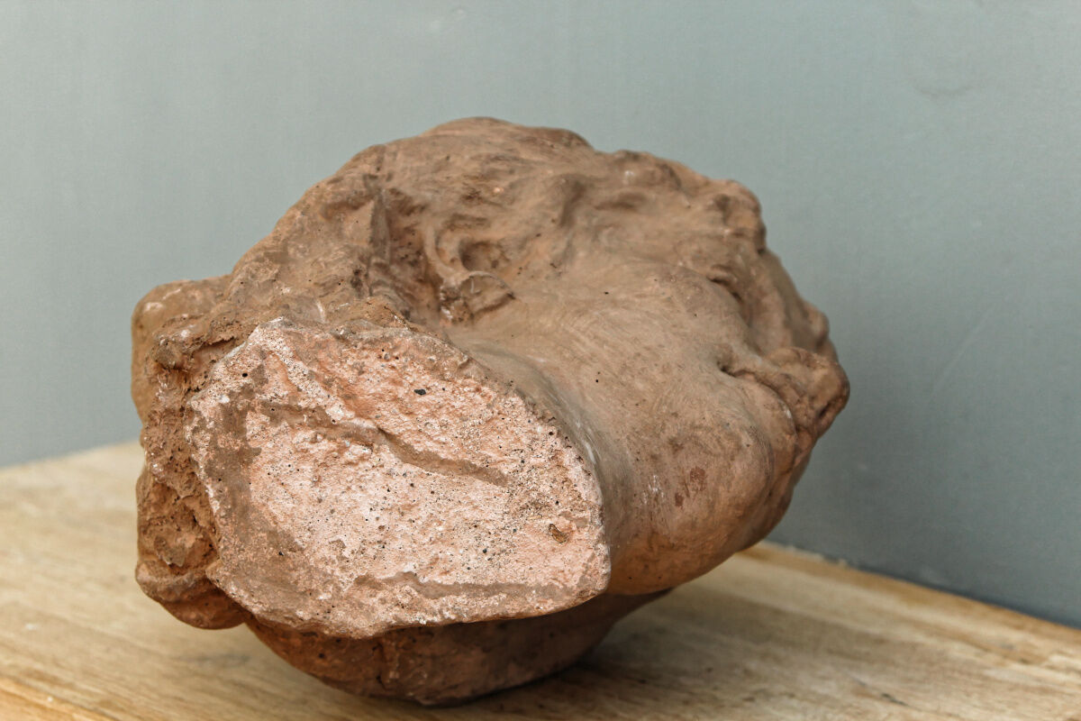Woman's head, reconstituted stone