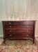 Empire style chest of drawers in solid mahogany