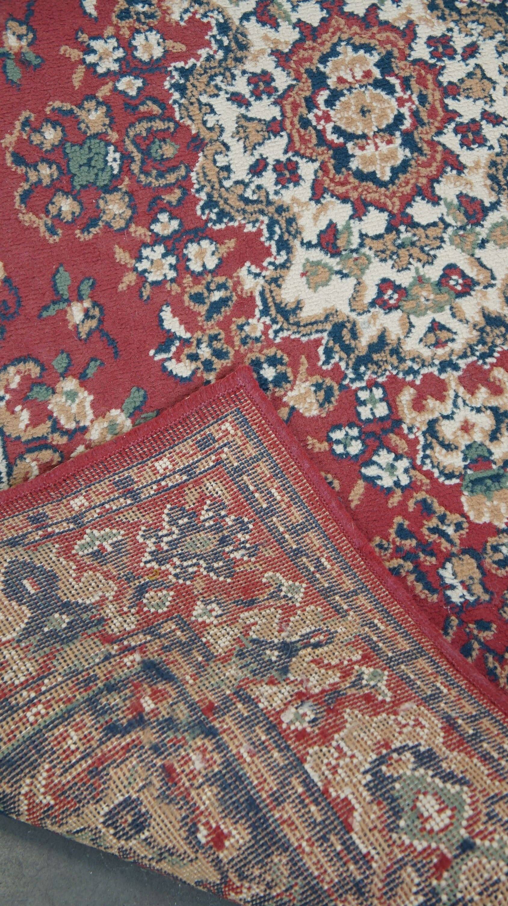 Vintage oriental rug with predominantly red, cream, and beige colors, measuring 168x120 cm
