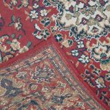 Vintage oriental rug with predominantly red, cream, and beige colors, measuring 168x120 cm