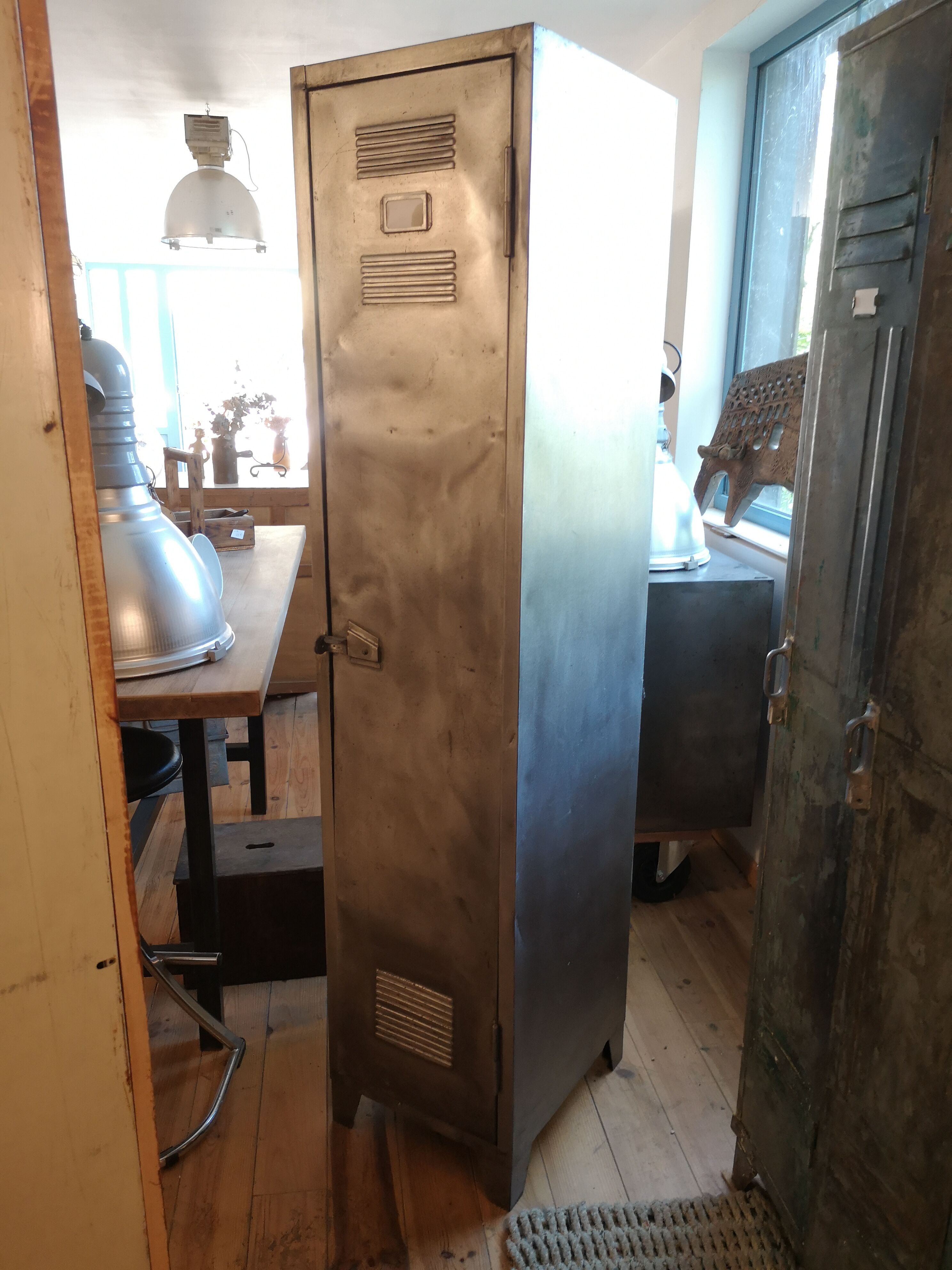 Cloakroom a waxed pickled metal door