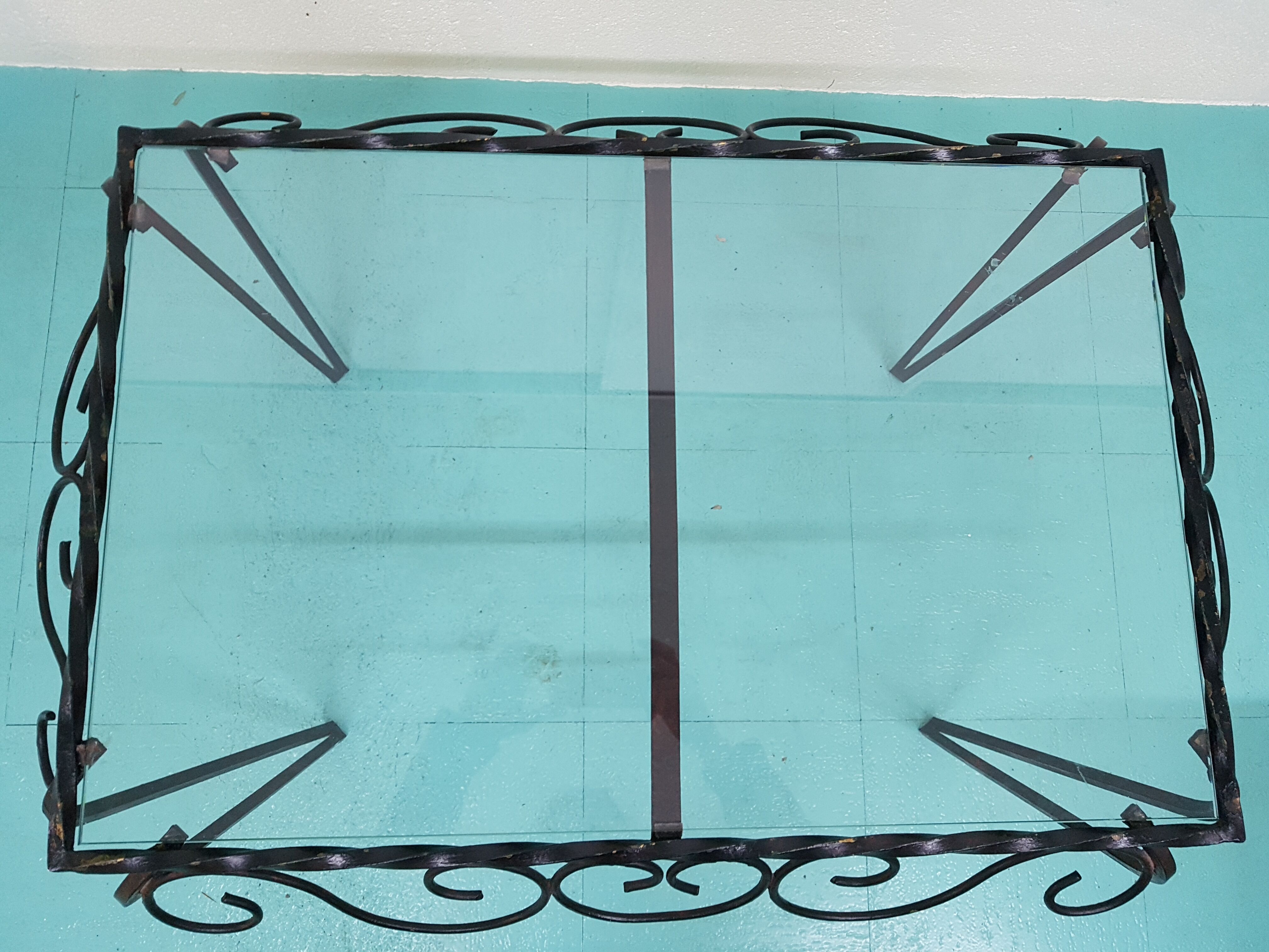 Wrought iron and glass coffee table
