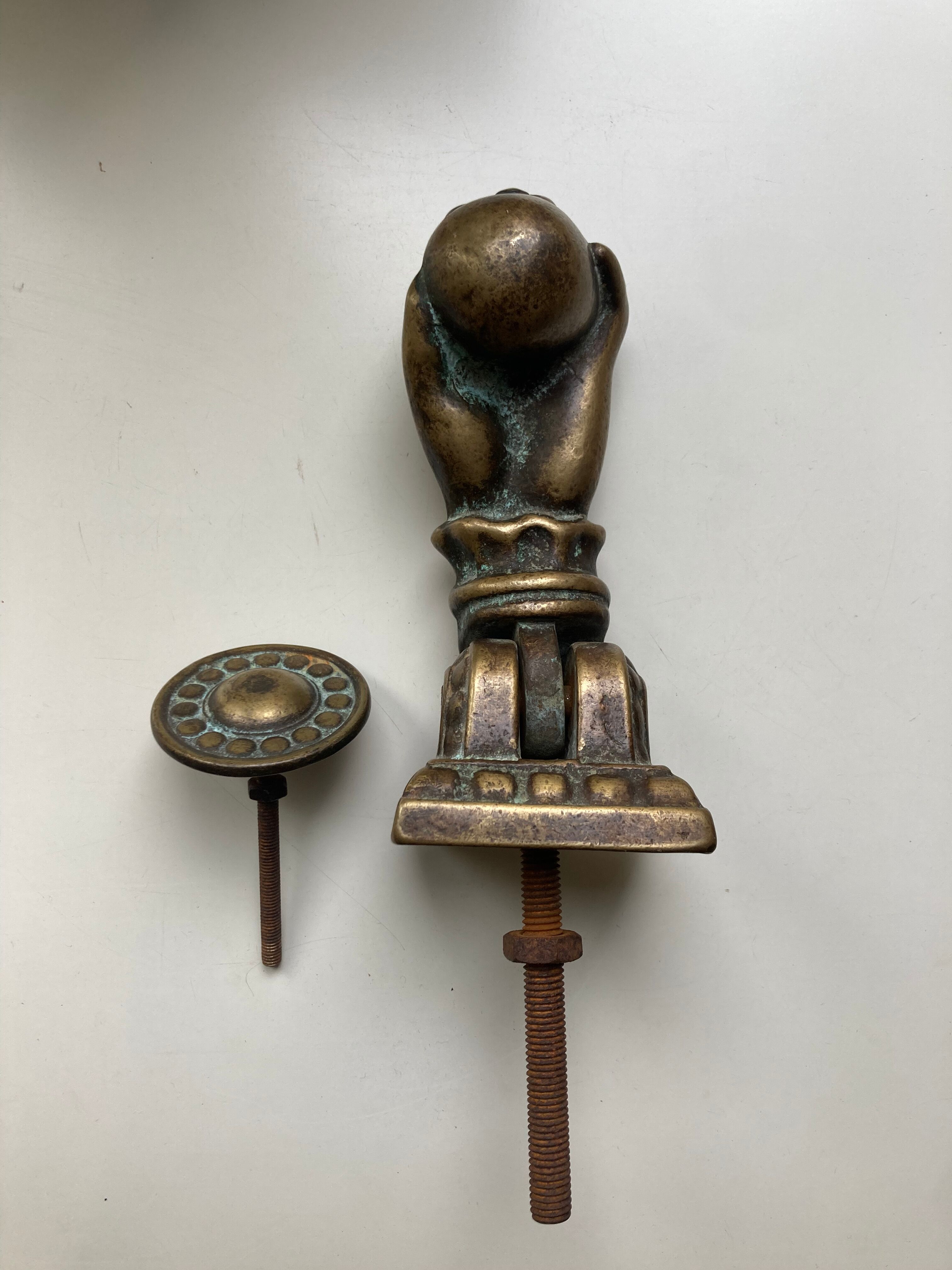 Antique bronze hand-shaped door knocker