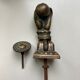 Antique bronze hand-shaped door knocker