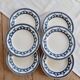 6 vintage flat plates with a blue and white goose pattern.