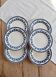 6 vintage flat plates with a blue and white goose pattern.