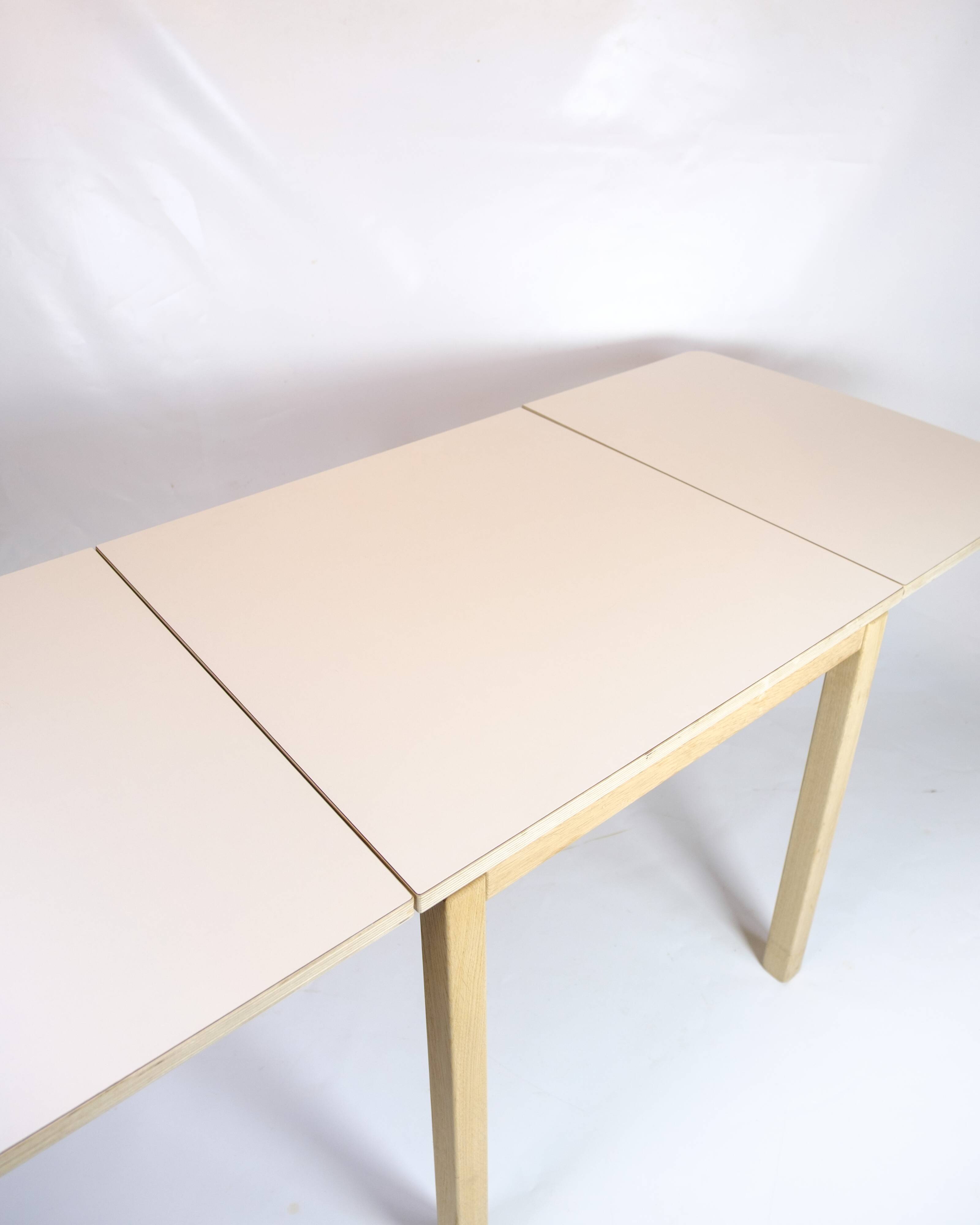 Table with drop leaves - Model 517 - White laminate top - Oak - Haslev Møbelsnedkeri