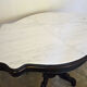 Table violon Napoléon III en bois noirci et marbre blanc, XIXe siècle