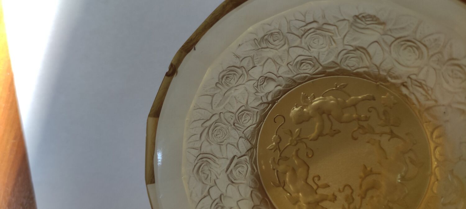 Old empty cup golden yellow glass pocket