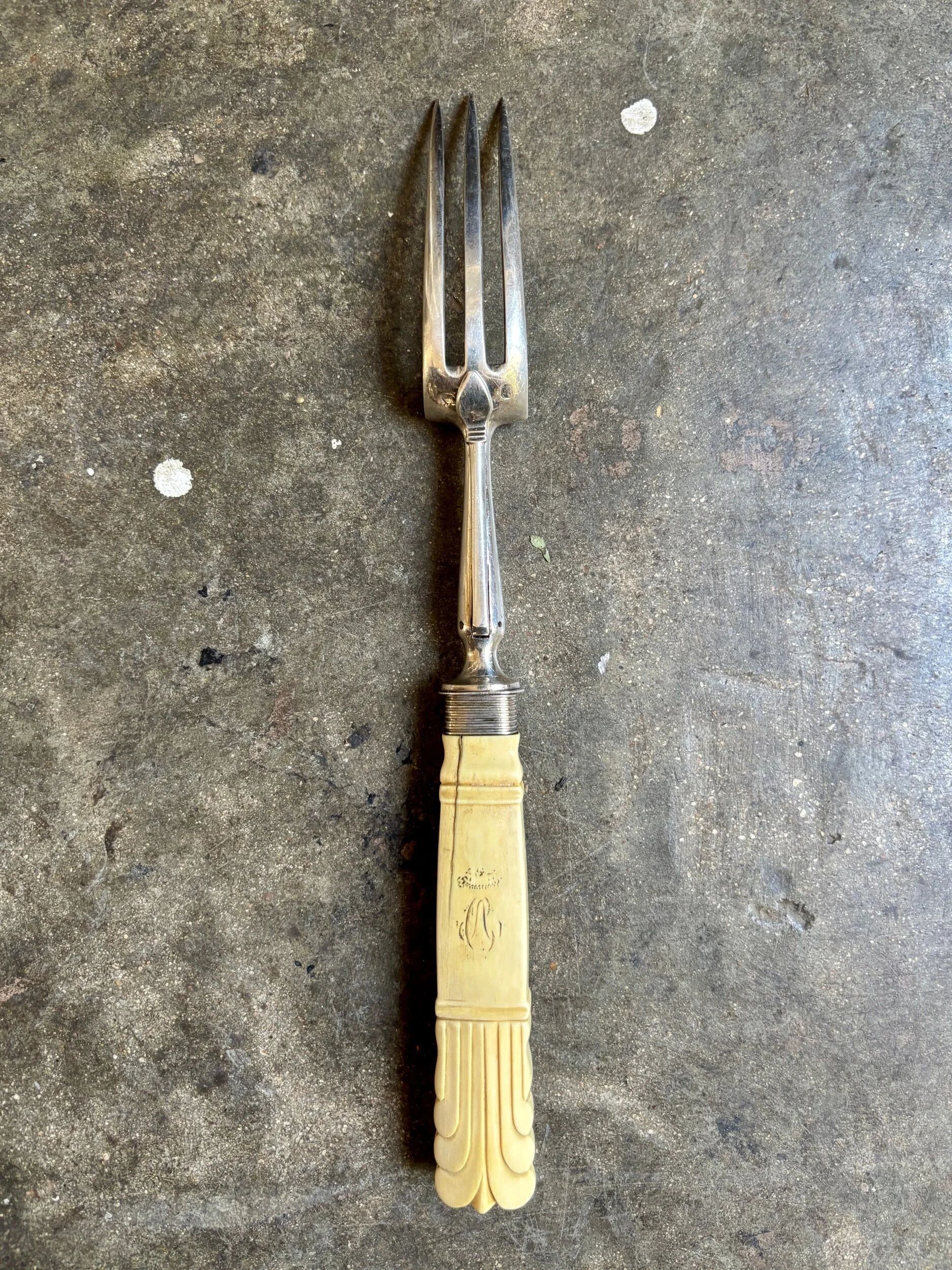 Silver and bone serving fork