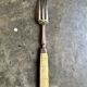Silver and bone serving fork