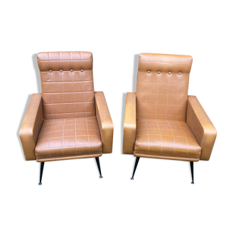 Pair of vintage armchairs in skaï