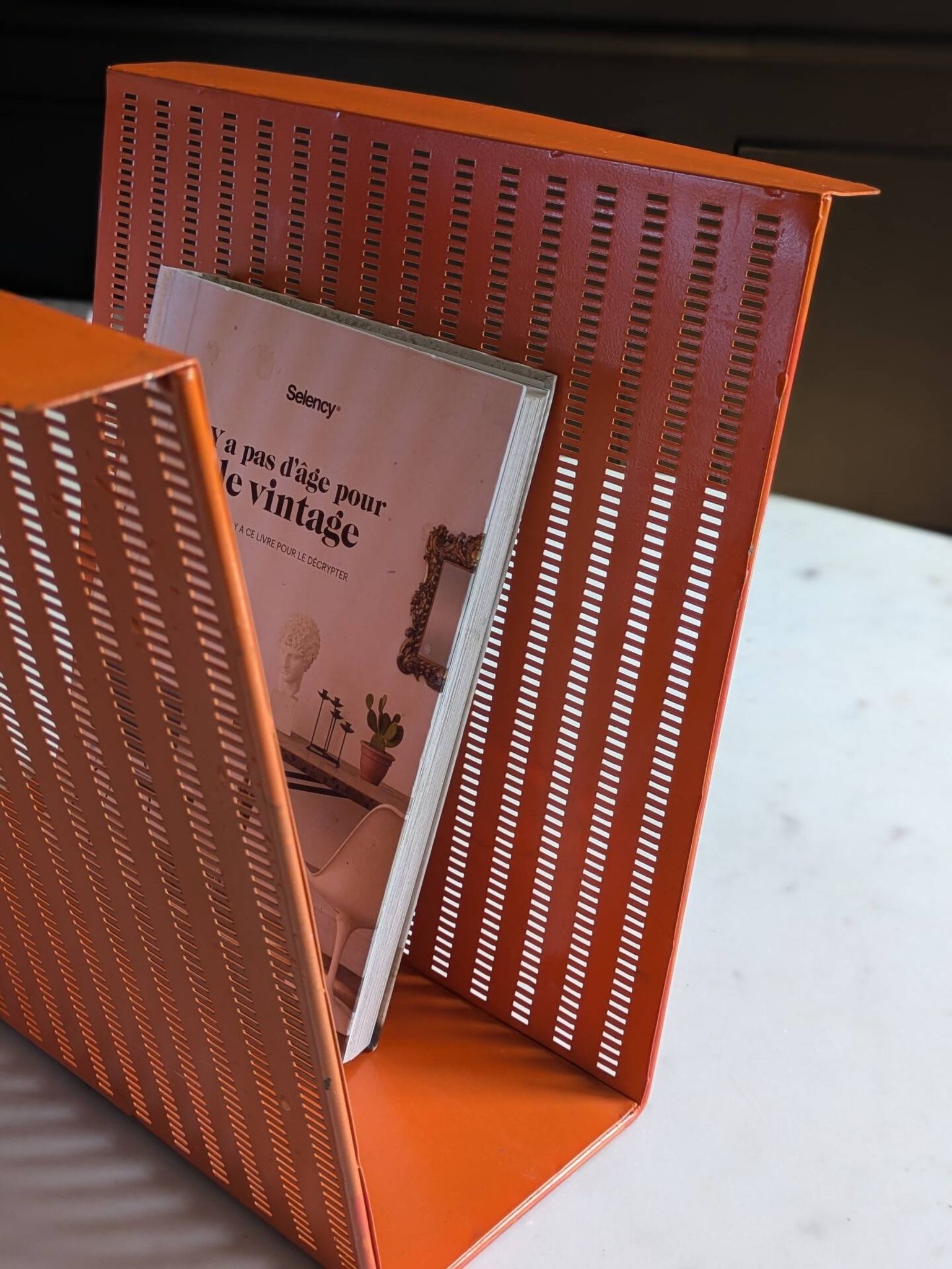 Vintage metal magazine rack in perforated orange/Mathieu Mategot style/70s