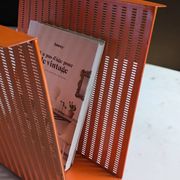 Vintage metal magazine rack in perforated orange/Mathieu Mategot style/70s